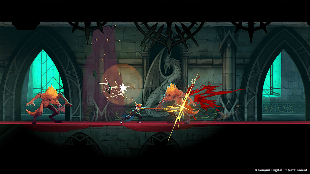 Two orange-maned werewolves on the ground.